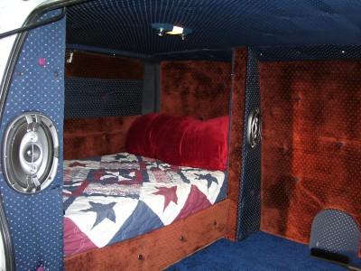 Back compartment. Bed and storage.