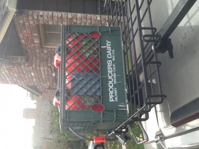 2of the plastic 2 1/2 gal cans fit in milk crate.  Secure well with cable lock.