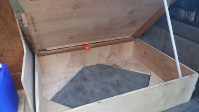 Here's the rear bed box opened up. It is not hinged so that it can be opened from the opposite direction. Note I did not install a floor, but built on the carpet. The jury is still out on that decision.